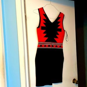 Beautiful brown and orange sweater dress. Front and back identical